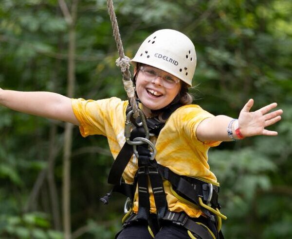 CQ camper on high ropes course