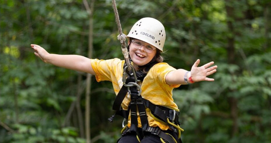 CQ camper on high ropes course