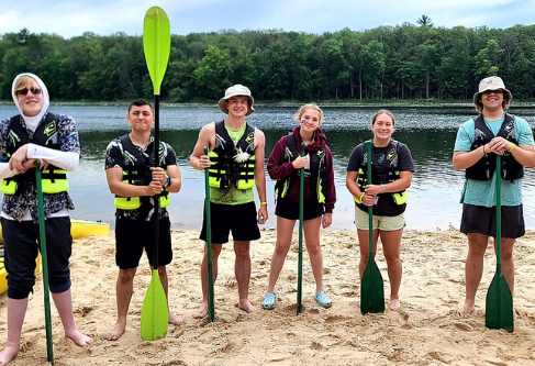 volunteers getting ready for canoeing
