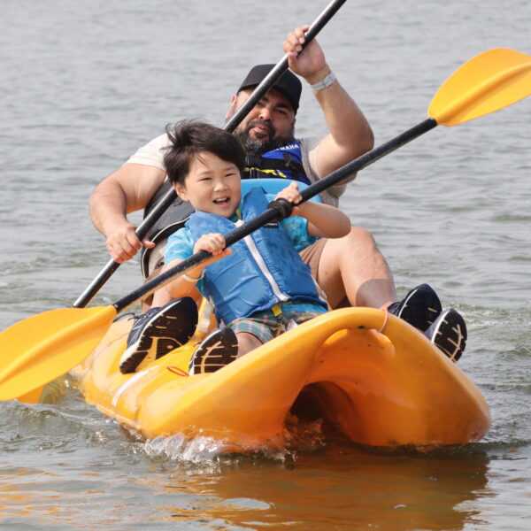 campers canoeing